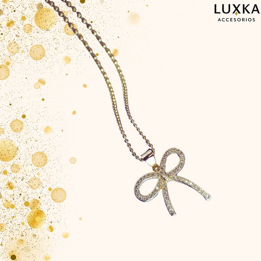Cadena Diva en acero inoxidable – 27 cm con dije de moño brillante